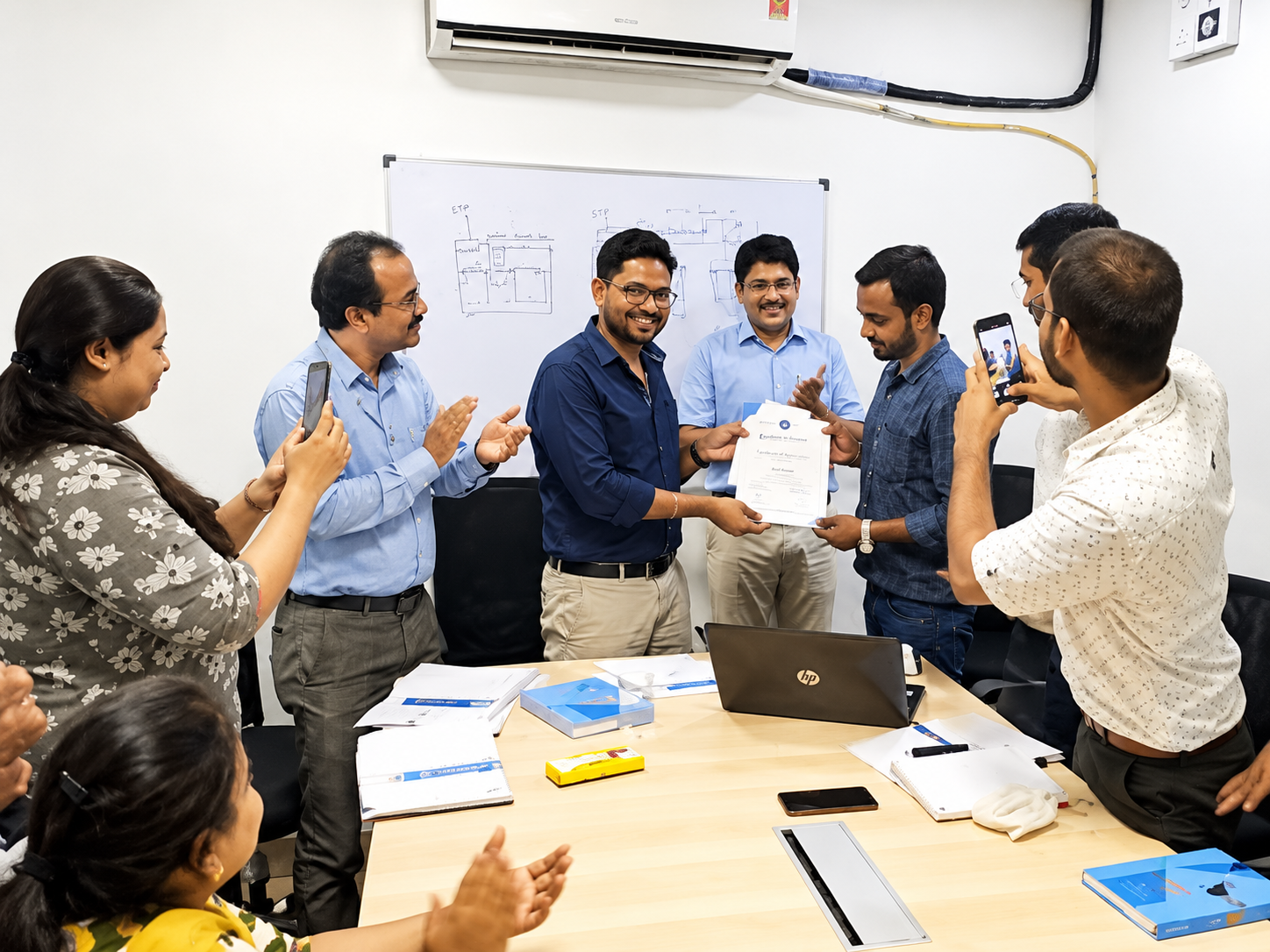 EESPL team members during an in-house recognition event